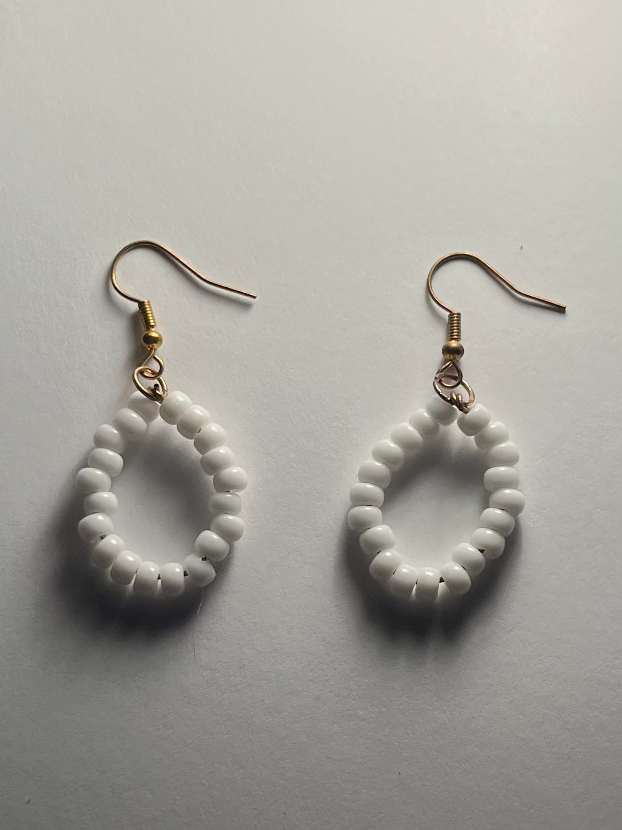 white beaded hoop earrings