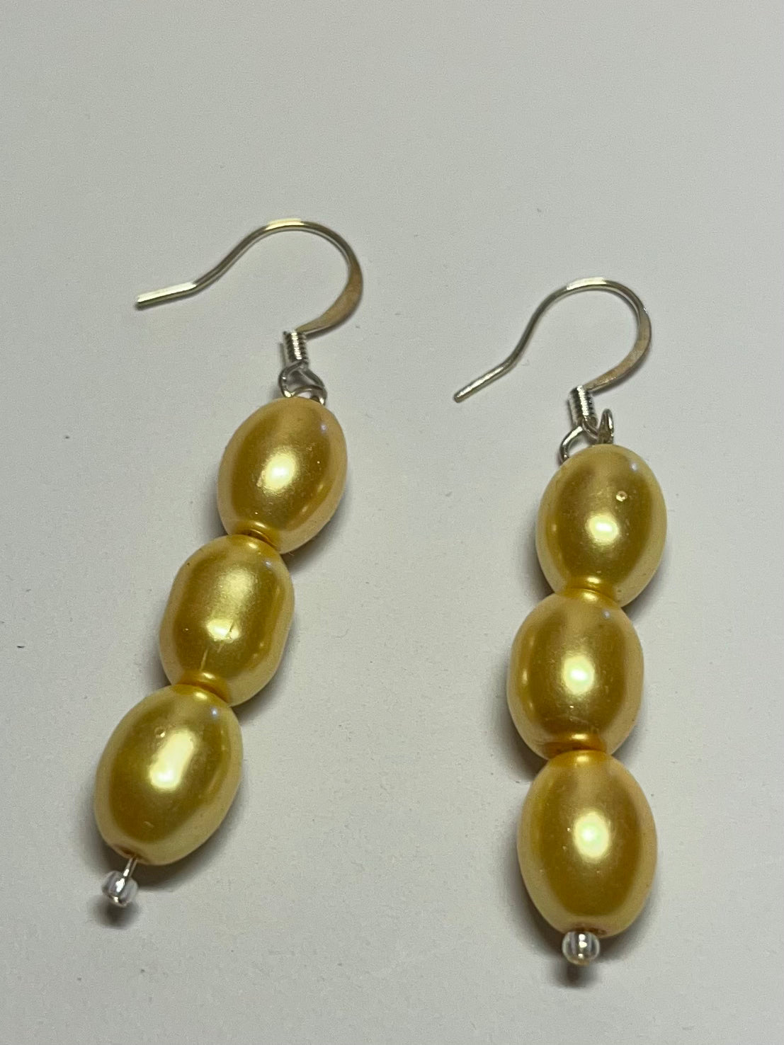 Yellow pearl drop earrings